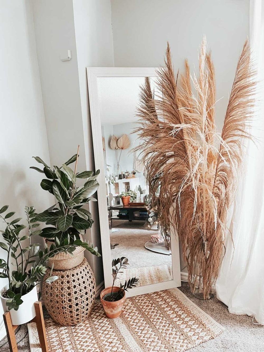 Tall brown and beige pampas grass in floor vase for By Two Fields